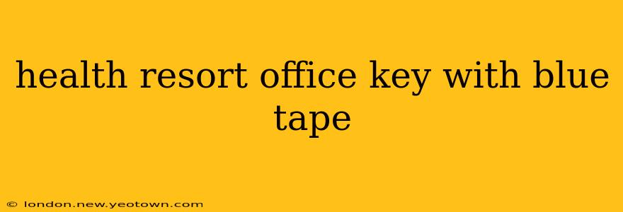health resort office key with blue tape